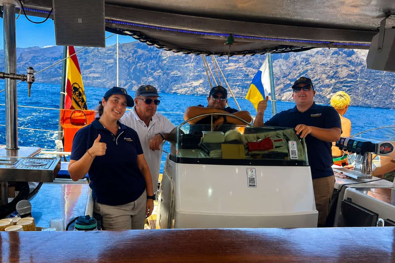 Freebird crew on board during a private catamaran charter in Tenerife, supporting groups throughout their exclusive boat trip.