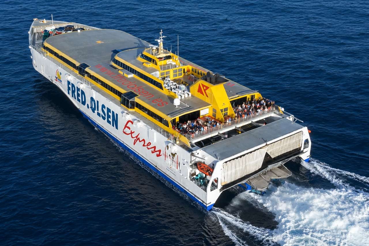 A Fred. Olsen Express ferry sailing across the Atlantic between Tenerife and La Gomera. The fast ferry connection from Los Cristianos provides the sea crossing used on many La Gomera day trips from Tenerife, offering passengers an efficient journey between the two Canary Islands