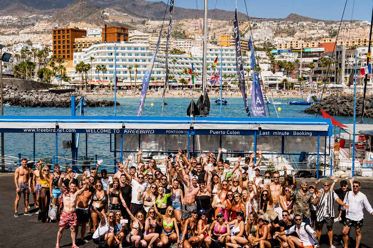 Utopia Boat Party guests gathering at Puerto Colón before heading out for the party at sea.