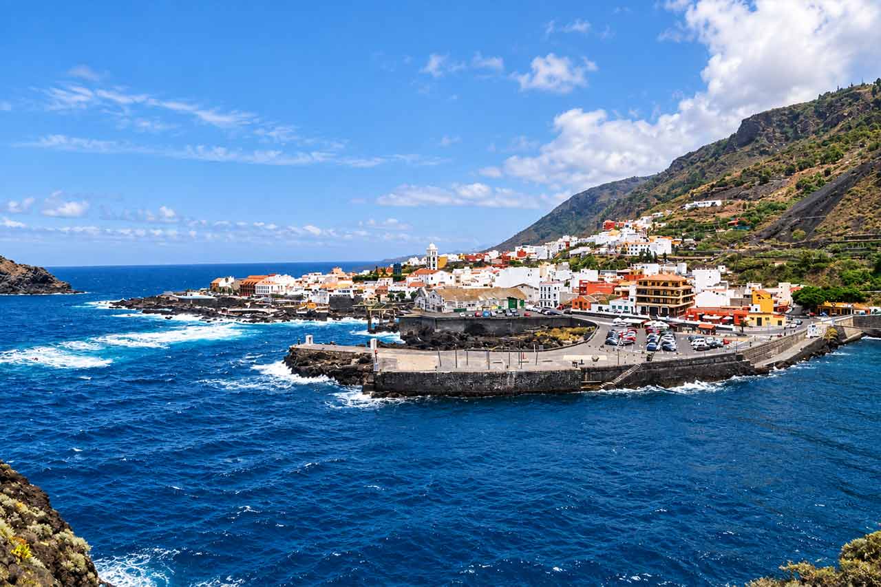 Panoramic view of Garachico on Tenerife's north coast, the third main tour stop and a historic town dramatically reshaped by volcanic activity.