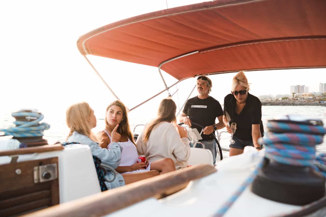 Crew and guests on the small group whale watching tour