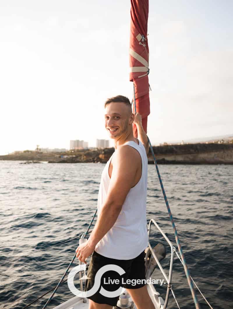 Roy Schijvens, founder of Club Canary, on a private whale watching sailing yacht at sunset in Tenerife