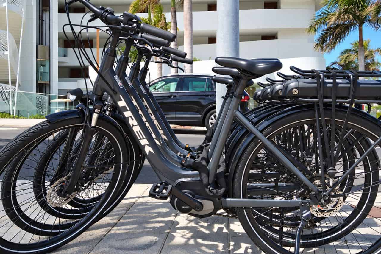 Trek electric rental bikes parked outside a hotel in south Tenerife