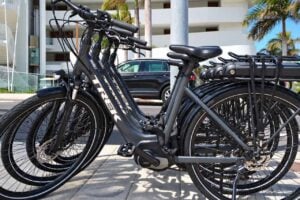 Trek electric rental bikes parked outside a hotel in Tenerife, ready for exploring the island.