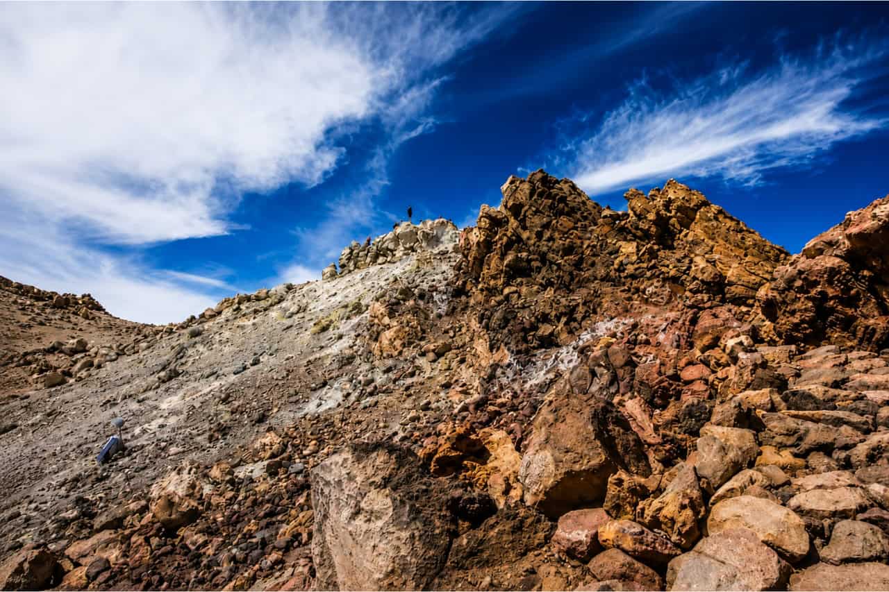 Rugged volcanic rock formations along the Official Teide Hike route on Mount Teide in Tenerife.