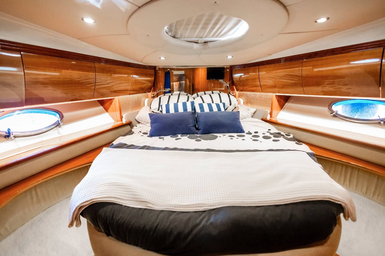 Master bedroom cabin inside a luxury yacht charter in Los Gigantes Tenerife with premium comfort