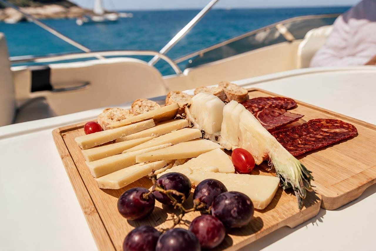 Charcuterie and cheese board served on the Seaduction yacht