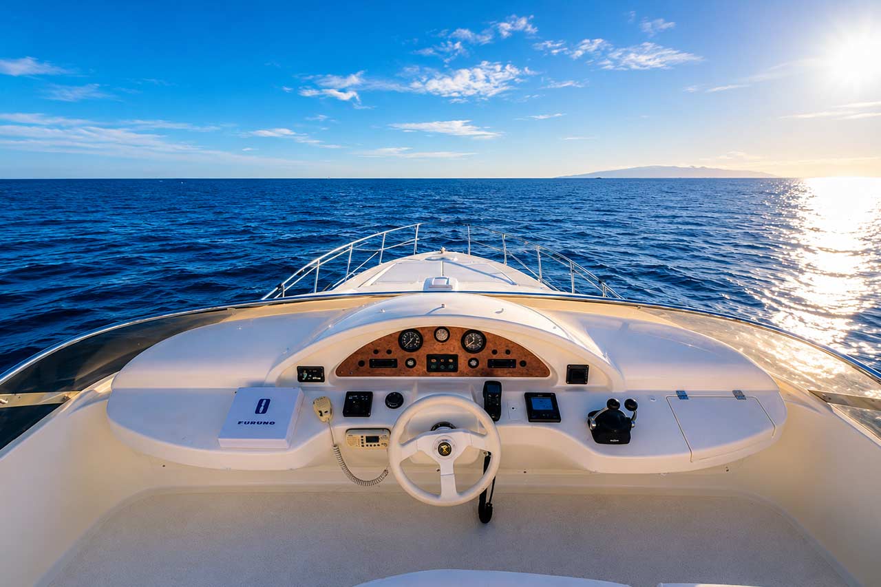 The helm of the Seaduction yacht with the captain