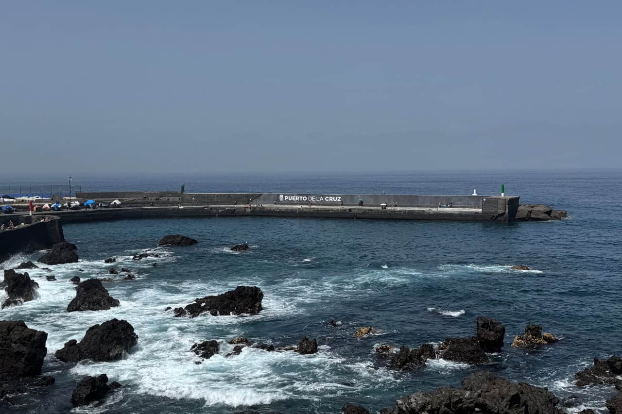 Rocky Atlantic coast and harbour of Puerto de la Cruz, Tenerife