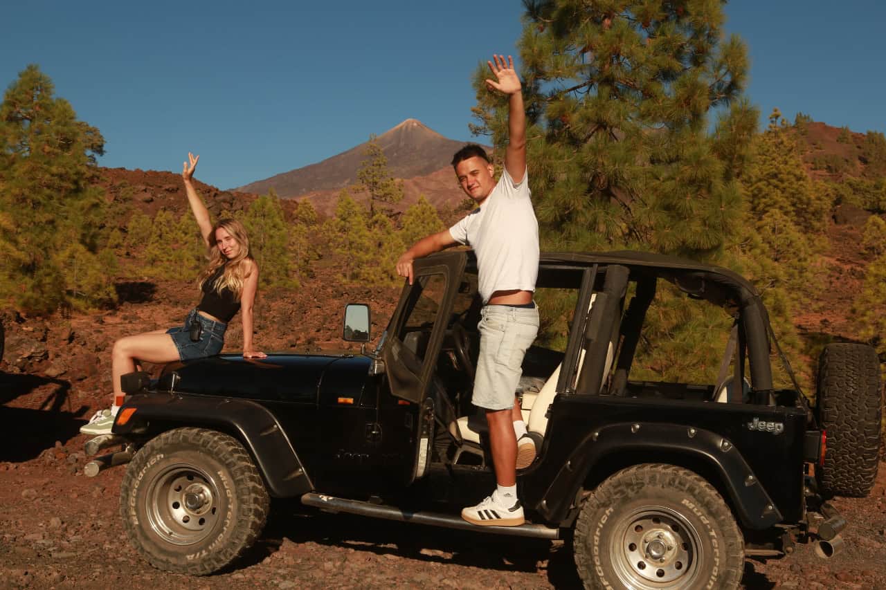 Friends on a jeep while having fun