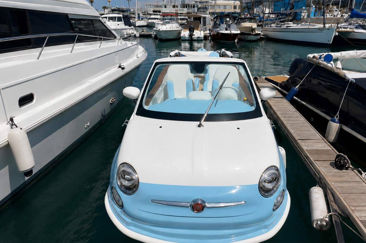 Open cockpit and seats of the floating car boat
