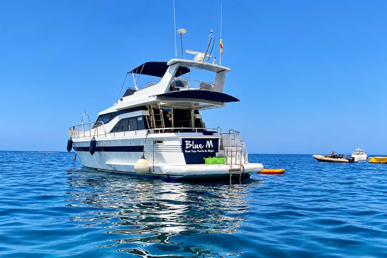 The Blue M motor yacht on the ocean near Puerto de Mogán