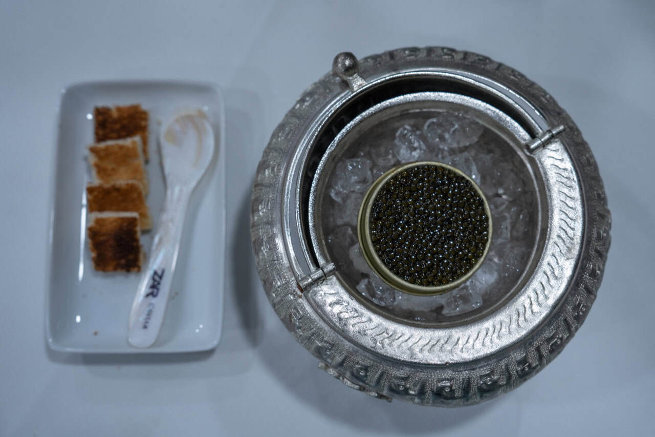 Premium caviar presentation served during a private luxury yacht experience in Tenerife with gourmet dining and personalized service.