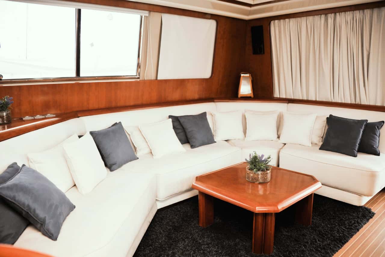 Comfortable indoor lounge on a luxury yacht for multi-day and overnight yacht stays in the Canary Islands.