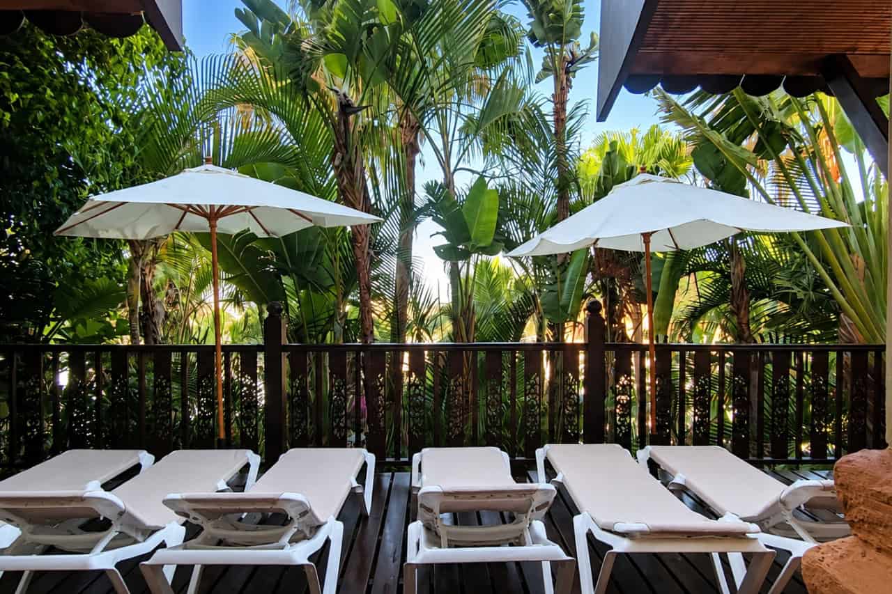 Private VIP relaxation area with sun loungers and parasols included in the Siam Park VIP package in Costa Adeje, Tenerife.