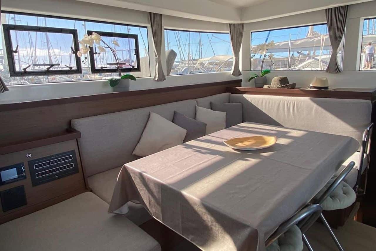 Lounge and dining area inside the Lagoon 40 catamaran