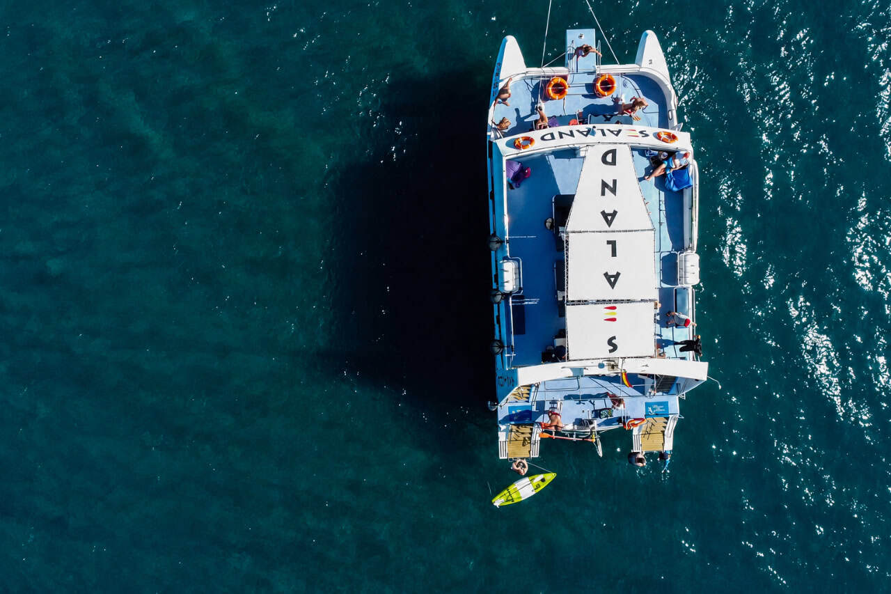 Aerial view of the Sealand catamaran in deep blue water near Fuerteventura
