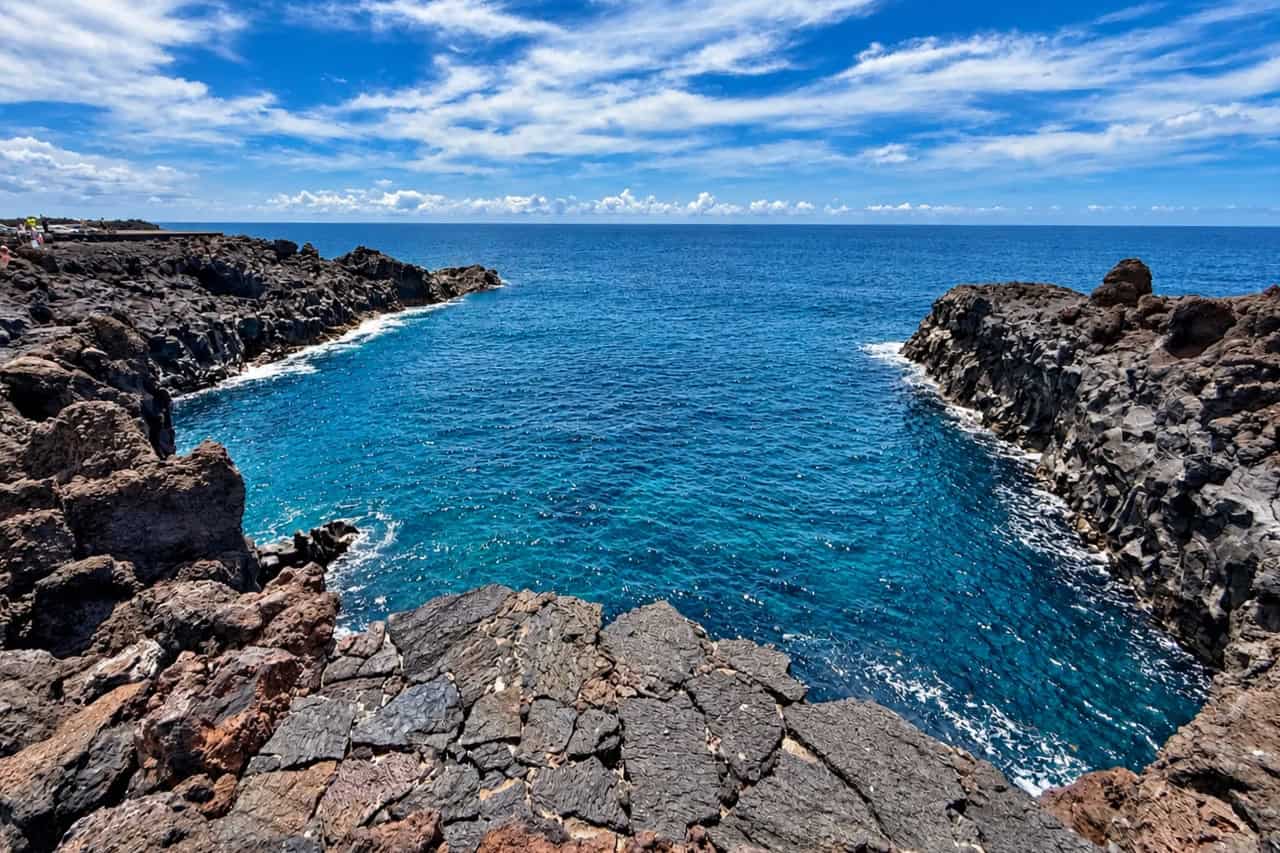 Waves rolling into the volcanic sea caves at Los Hervideros in Lanzarote