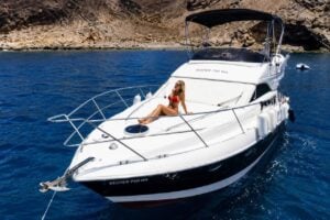 Private yacht cruising along the coast of Gran Canaria
