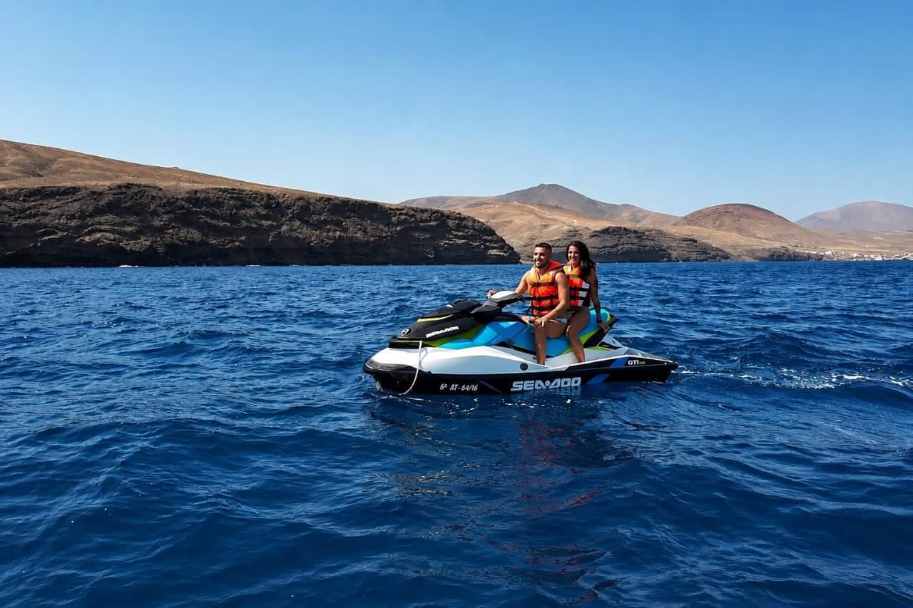 Two adults sharing a Sea-Doo jet ski near the Lanzarote coast