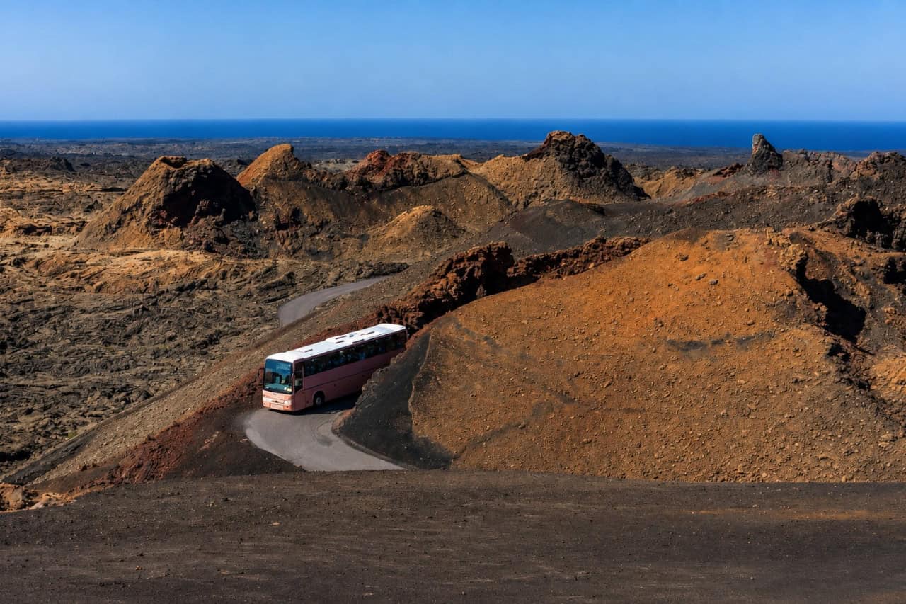 Timanfaya tour coach driving through the volcano landscape of Lanzarote