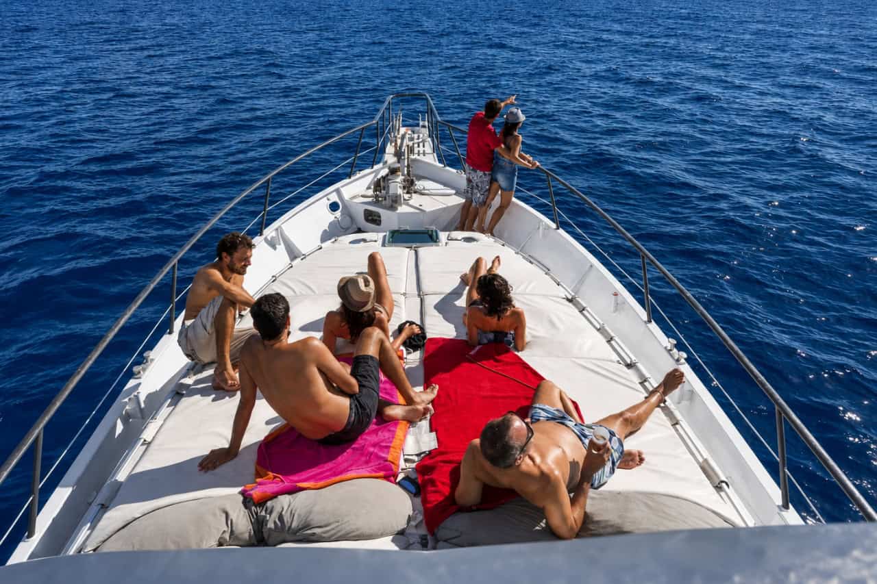 Guests on the bow during the 4-hour boat trip to Papagayo