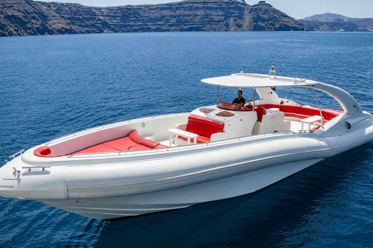 Opera 60 luxury RIB on the ocean near Tenerife with its spacious red seating visible