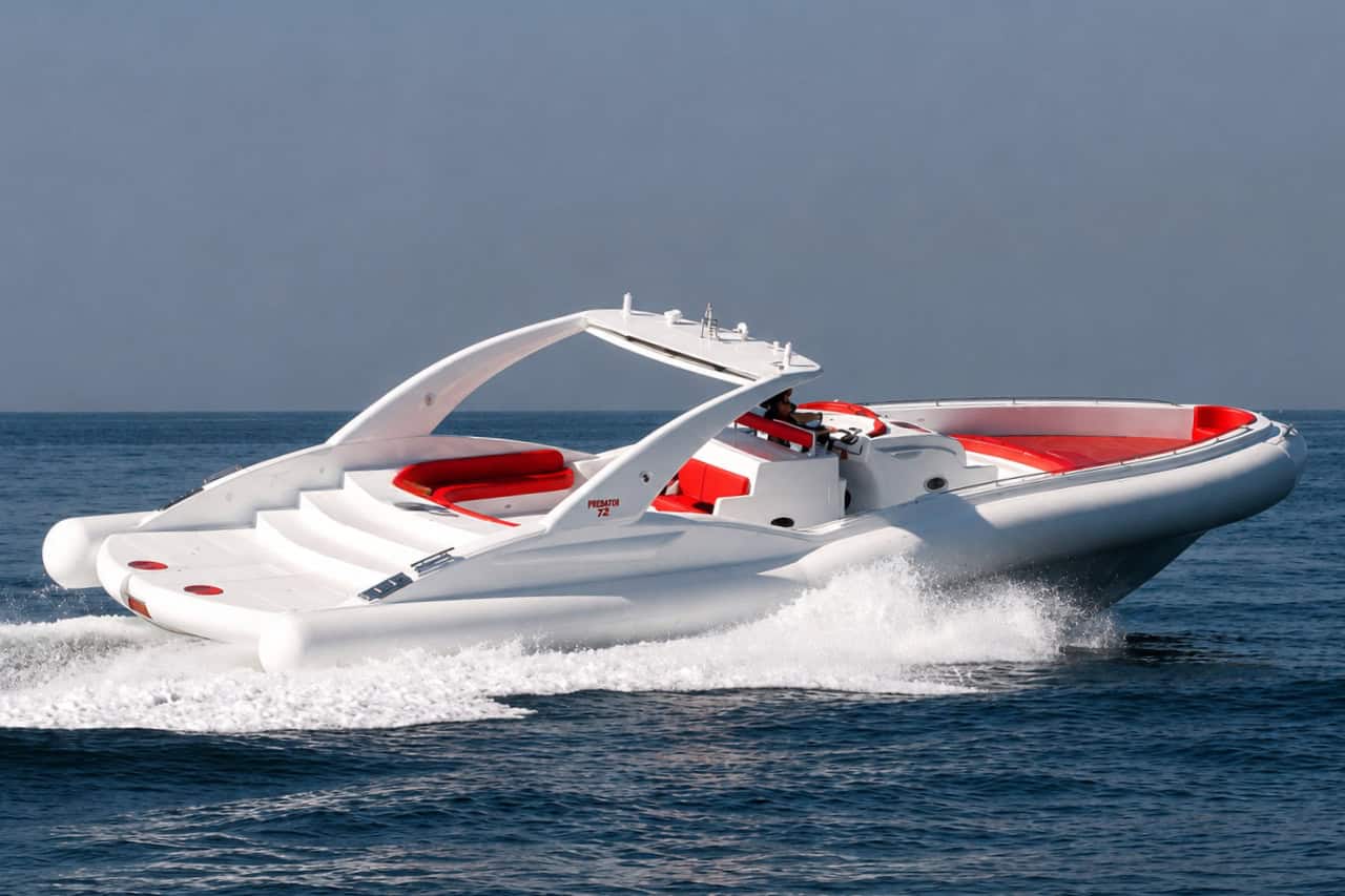 Guests relaxing on the rear deck of the Opera 60 during a private boat trip in Tenerife