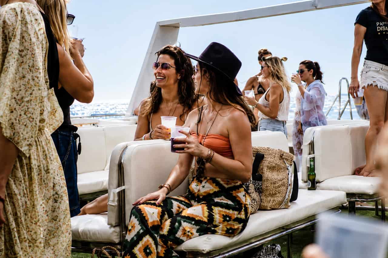 People enjoying drinks and live music on a Gran Canaria boat party