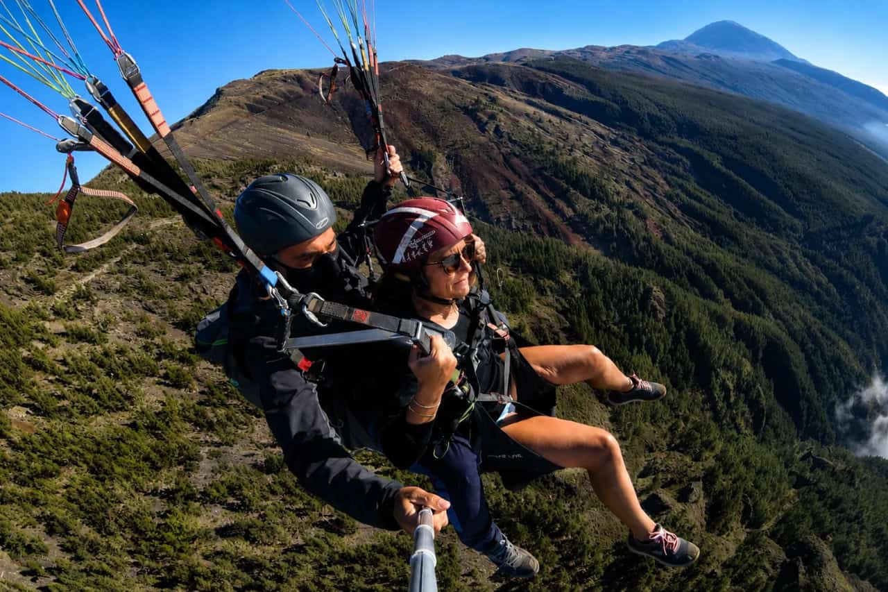 Tandem paragliding in Tenerife with dramatic mountain and Teide views
