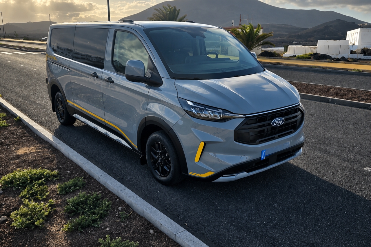 Luxury tour minivan parked beside volcanic mountains in Fuerteventura
