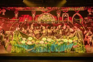 The cast performs during a dinner show in Gran Canaria at Sala Scala with theatrical lighting