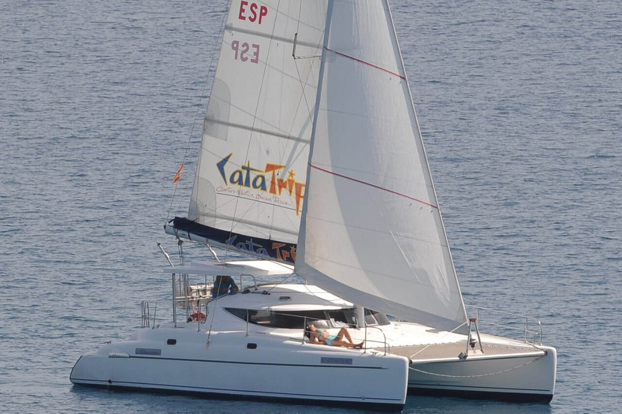 Small group catamaran sailing off Morro Jable in Fuerteventura