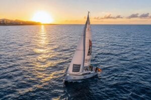 Aerial view of a luxury sailing yacht during a 3-hour whale watching tour in Tenerife at sunset.