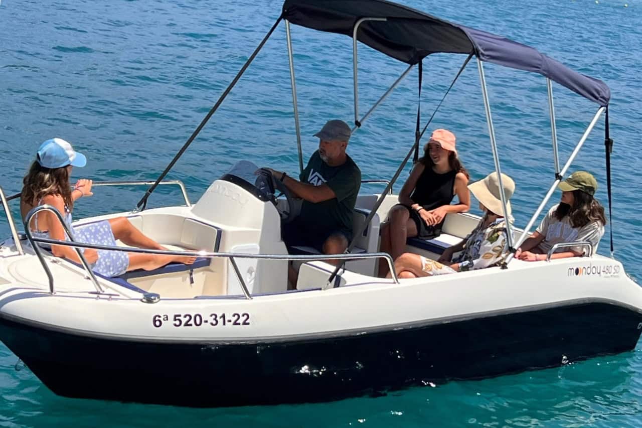 Family enjoying self-drive boat hire in Tenerife without a licence