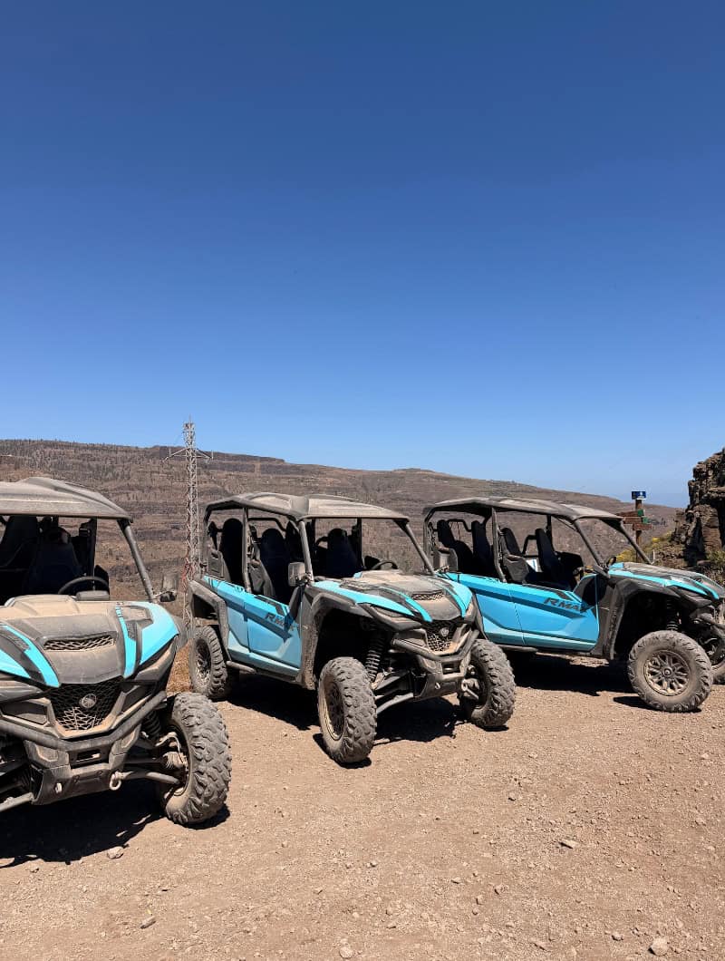Buggy Safari Gran Canaria Mountain Stop A line of buggies parked on a mountain track during a buggy safari in the south of Gran Canaria.