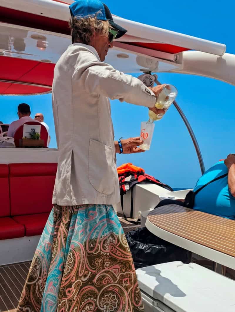 Chilled bottles on board the Opera 60 private boat with Tenerife's coastline in the background