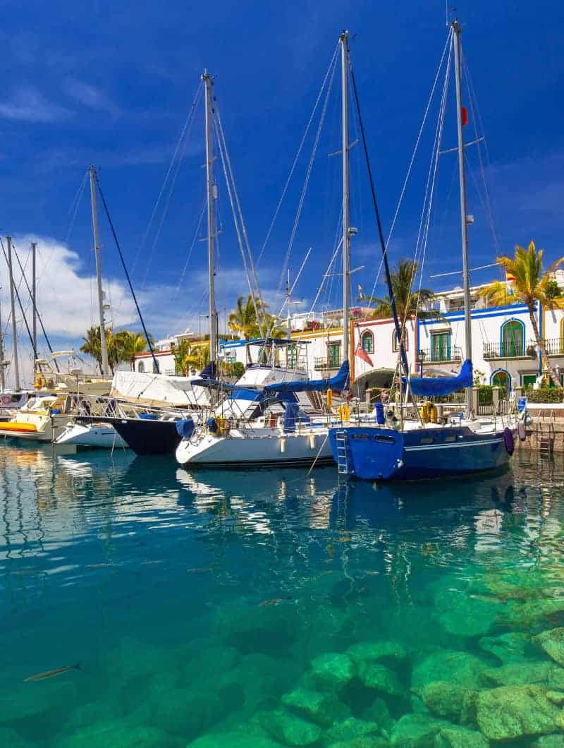 Sailboats in the turquoise harbour of Puerto de Mogan, Little Venice, on the Gran Canaria bus tour