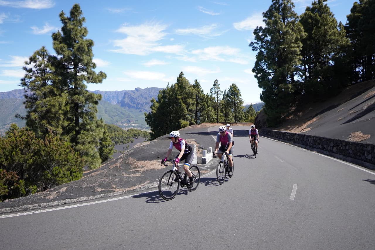 Cyclists on a guided road bike tour in the mountains of La Palma