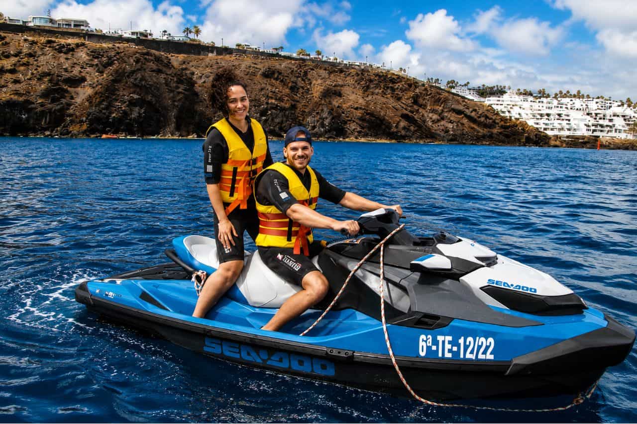 Couple on a Sea-Doo jet ski during the one hour jet ski hire in Lanzarote