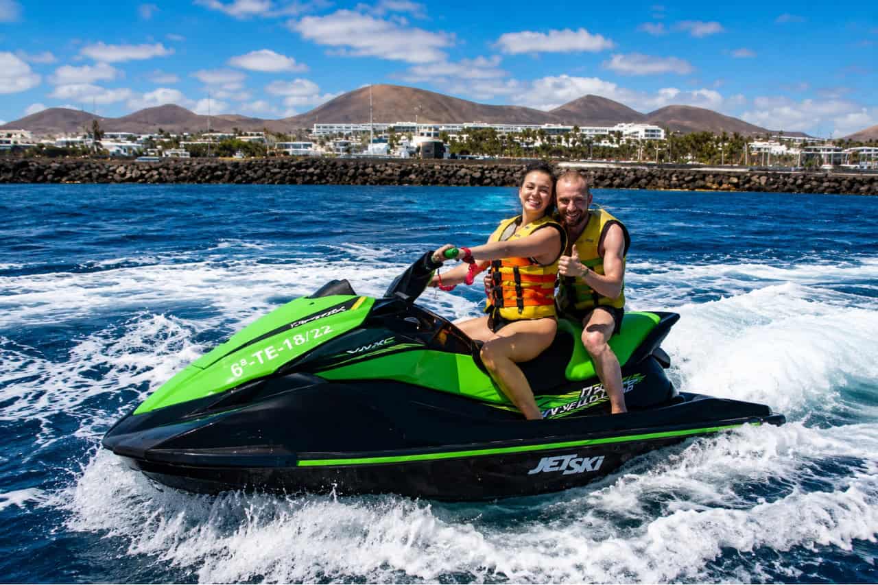 Couple riding a jet ski on the 2 hour safari in Lanzarote