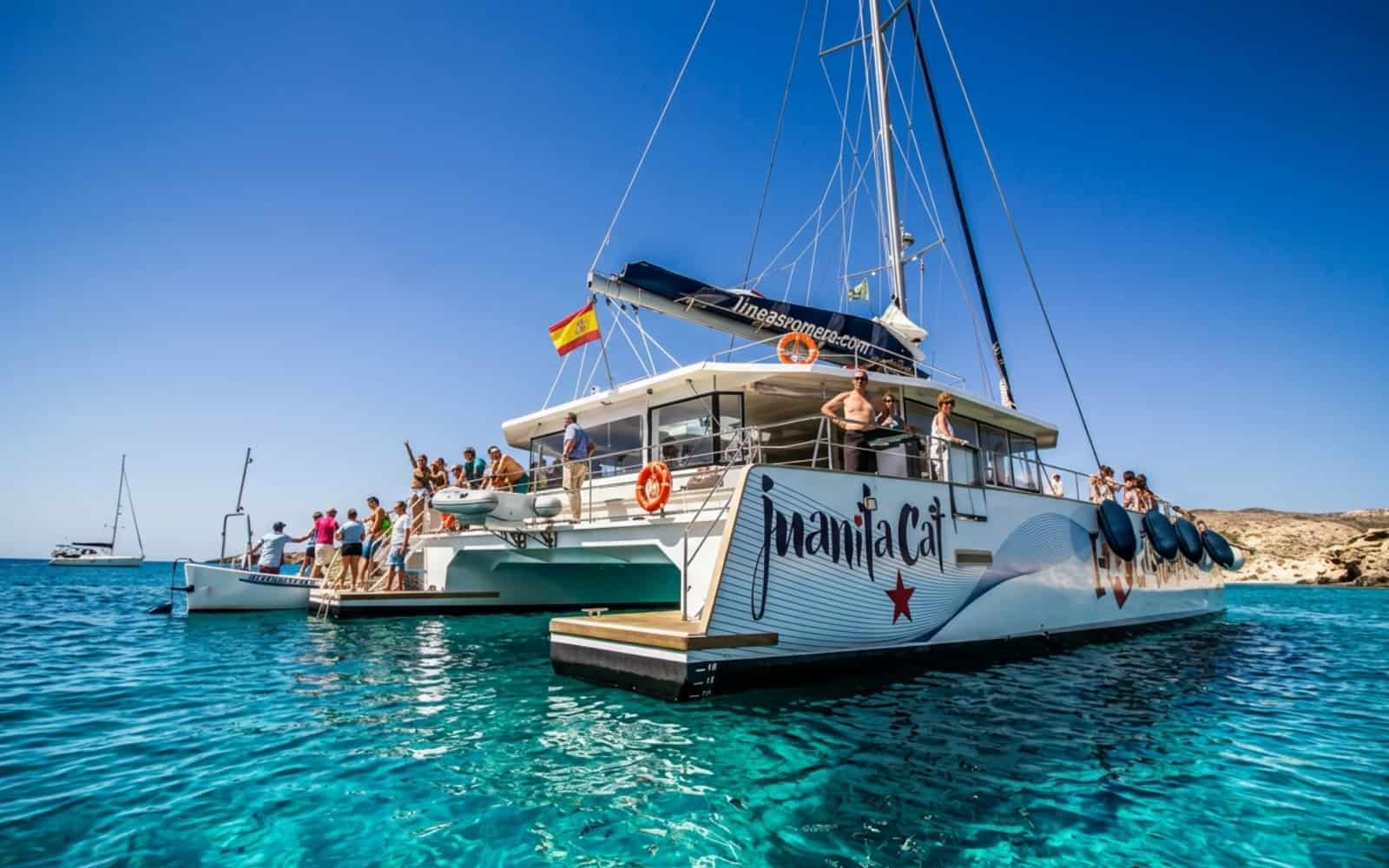 Catamaran in clear turquoise water near La Graciosa, Lanzarote