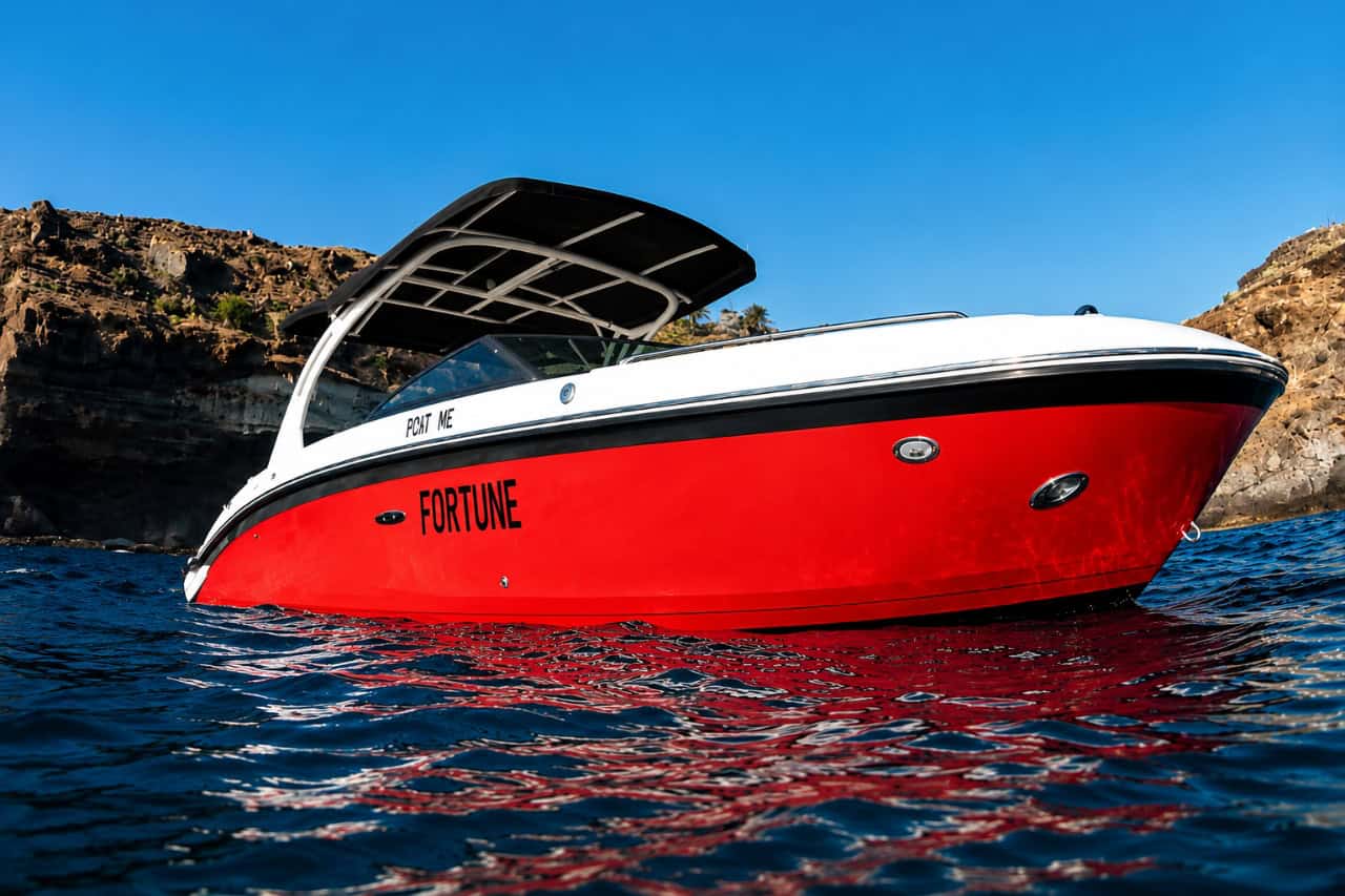 Hire a stylish red speedboat in Tenerife and enjoy the freedom of exploring the island's stunning coastline at your own pace. Perfect for licensed skippers looking for a private boating experience, swimming stops, hidden coves, and unforgettable days on the Atlantic Ocean.