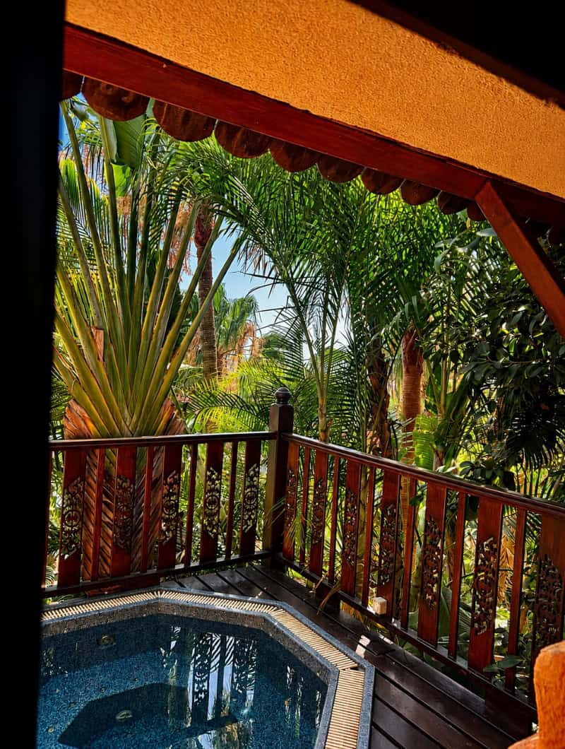 Private jacuzzi terrace at the Siam Park House with tropical views and wooden balcony
