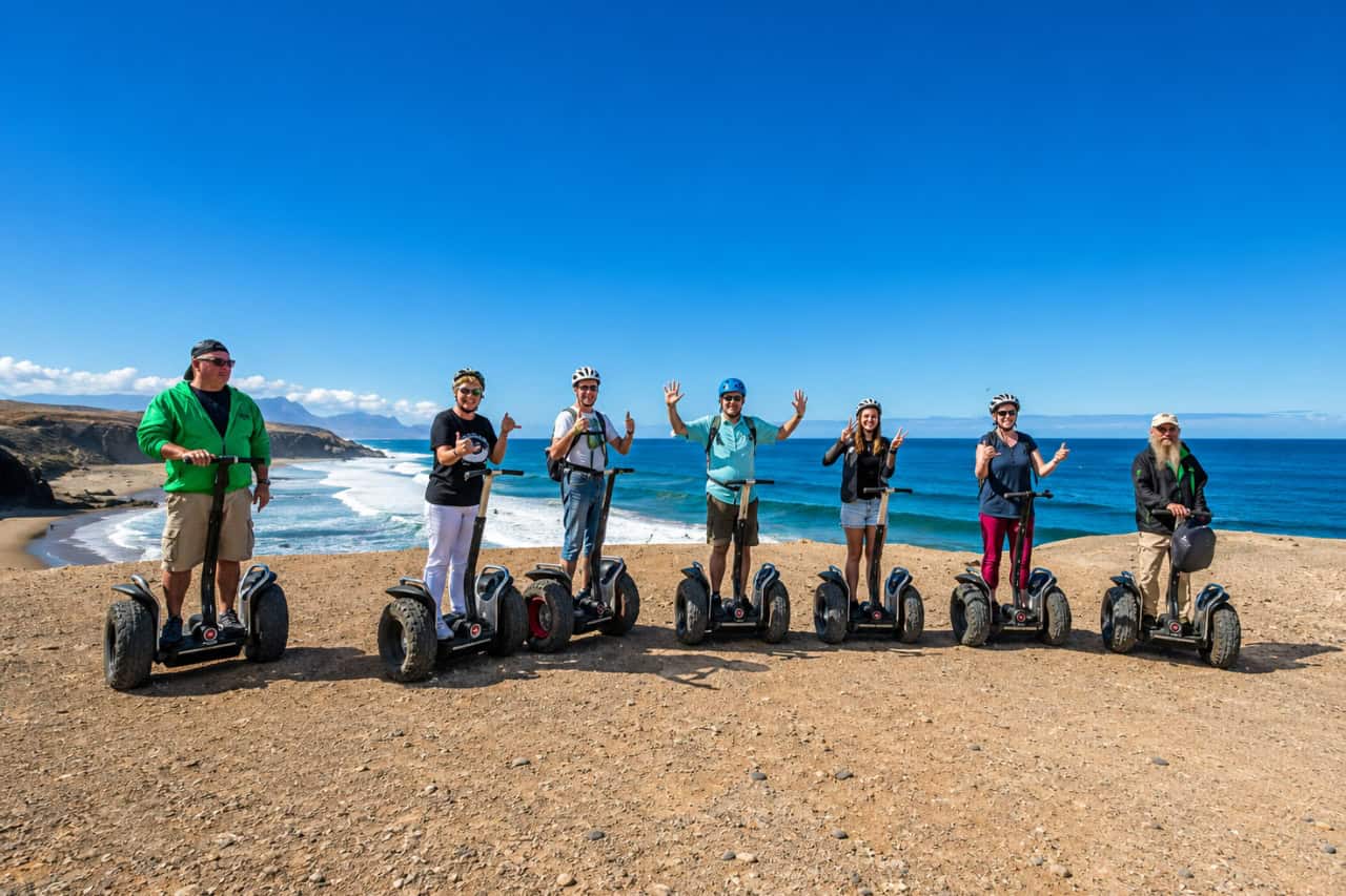Guests gliding along the Fuerteventura coastline on Segways