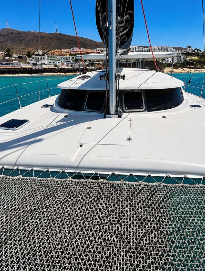 Spacious front deck and bow net of the private catamaran from Morro Jable, Fuerteventura