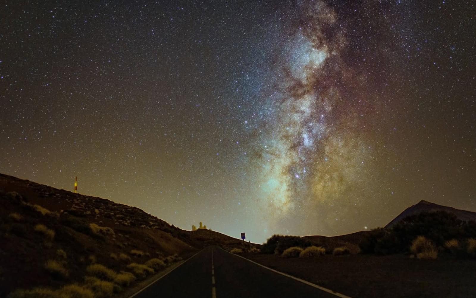 Milky Way above a volcanic road in Tenerife