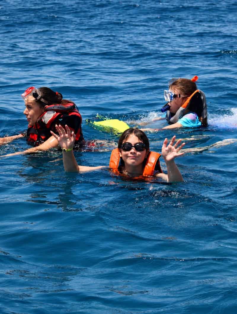 Guests swimming and snorkeling during the 90-minute Corralejo jet ski tour in Fuerteventura.