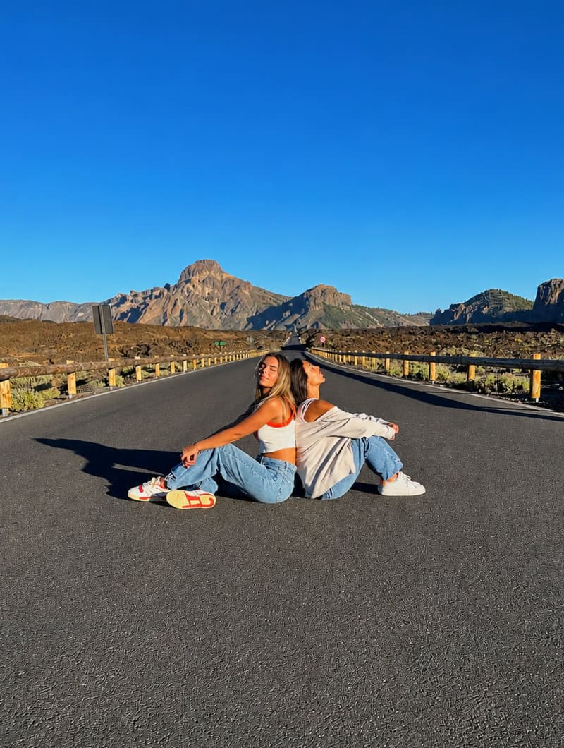 Guests taking a fun photo on the road near Teide National Park during a guided Monster Quad Tenerife tour.