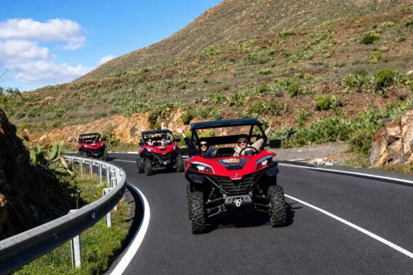 Top buggy Tenerife tour with several buggies driving on a scenic mountain road during a buggy trip in Tenerife.
